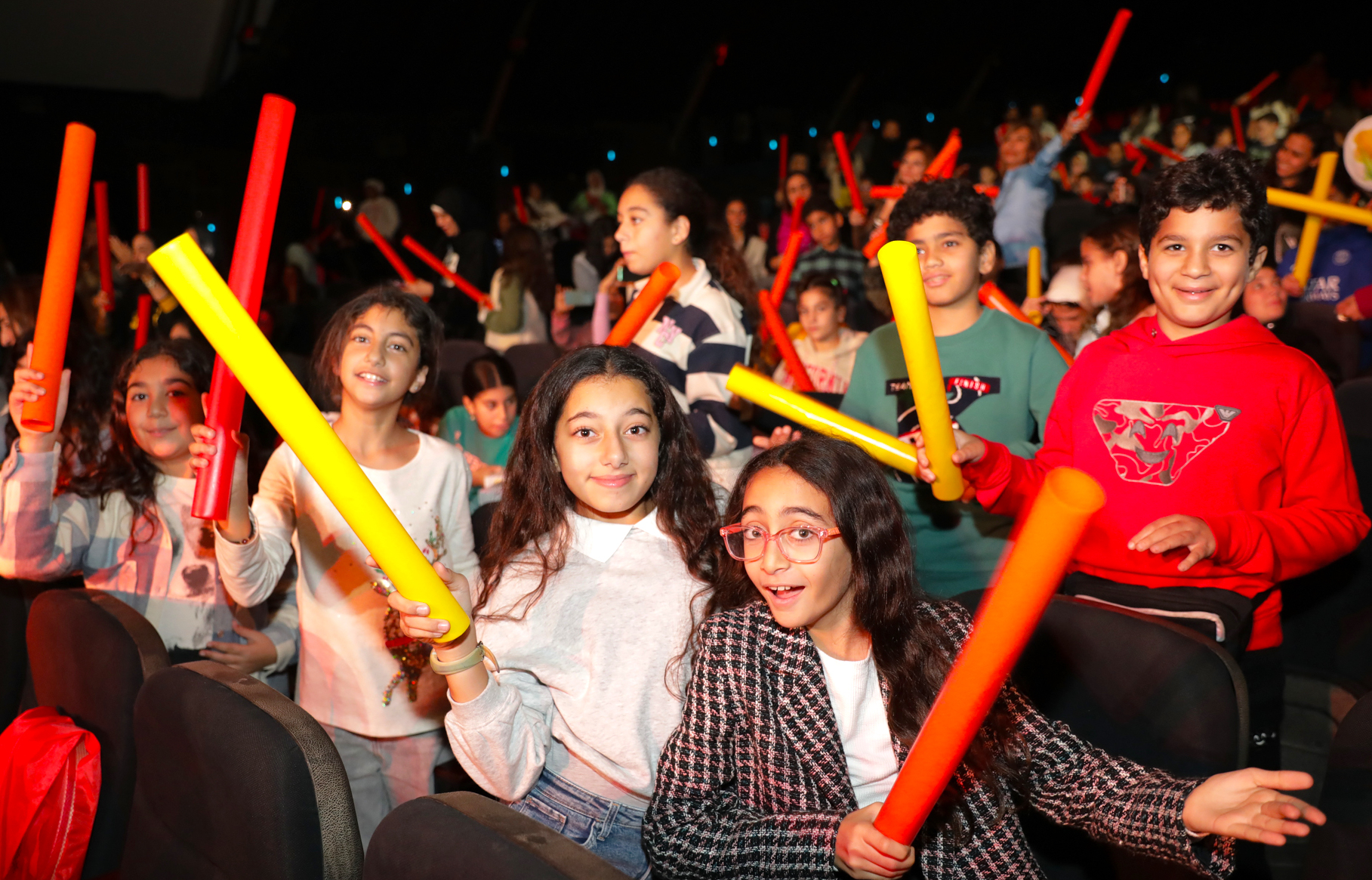 Students participate with colourful musical tubes