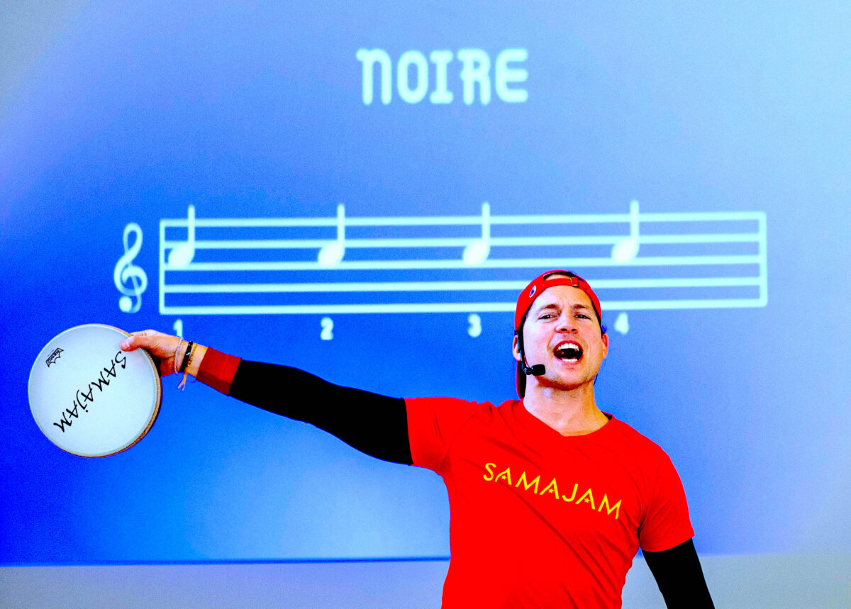 An artist teaches students musical concepts